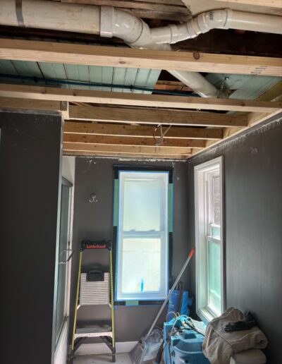 ceiling and room repair water damage restoration squeezed
